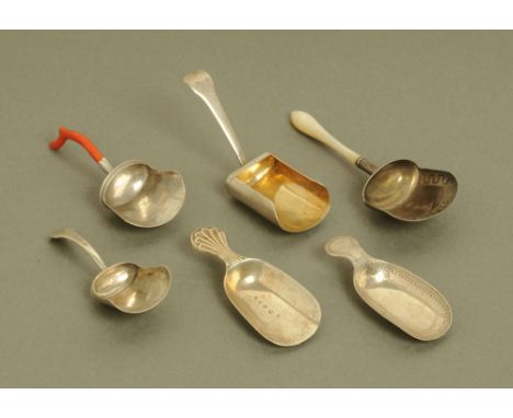 Five George III silver shovel form caddy spoons by Samuel Pemberton, including one with coral handle, all hallmarked for Birm