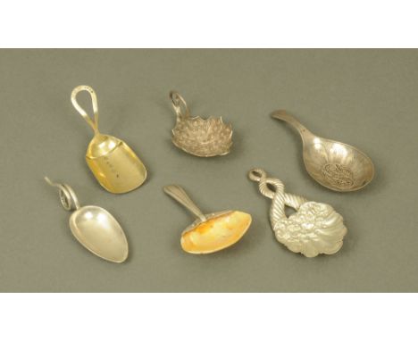 A Victorian silver mounted clam shell caddy spoon, the mounts with beaded terminal by Josiah Williams & Co, London 1886, a Ge