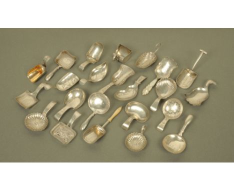 An important collection of twenty three George III silver caddy spoons by Cocks & Bettridge, displaying a very wide range of 