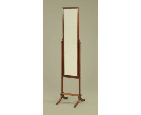 A mahogany cheval mirror, of slim rectangular form, raised on four downswept legs.  Height 164 cm, width 36 cm. CONDITION REP