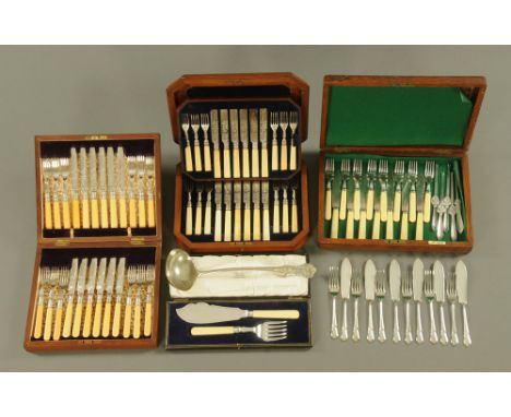 A walnut cased canteen, twelve pairs of fruit knives and forks, together with two other cased sets, fish servers, ladle and f