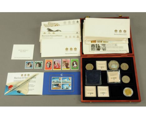 A selection of 40+ mint GB stamp presentation packs, by Harrisons &amp; Sons Ltd., of mint GB stamps and issue of first day c