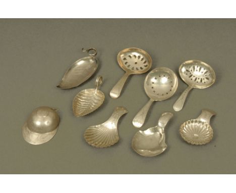 Nine George III silver caddy spoons by Joseph Taylor, displaying different styles and patterns, all with Birmingham assay mar