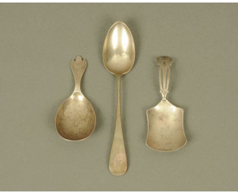 A William IV silver caddy spoon by Thomas Freeman, with pierced and engraved strapwork terminal and plain shaped bowl, Birmin