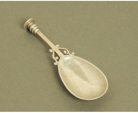 A George V silver seal top caddy spoon, with planished oval bowl by Frances Charlotte Harling, London 1934. CONDITION REPORT:
