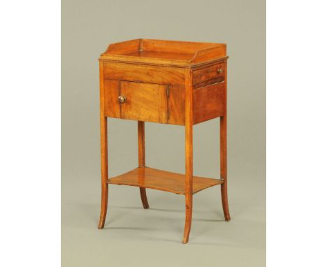 A 19th century mahogany bedside cabinet, with full gallery, single cupboard door and shelf below raised on splayed legs.  Hei