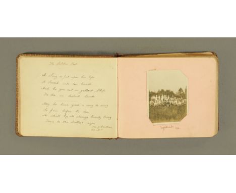 A First World War autograph album, containing photograph of Royal visits to Workington to meet wounded soldiers, together wit