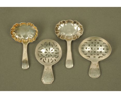 Four George III silver caddy spoons by Urquhart & Hart, displaying different styles and patterns, all hallmarked for London b