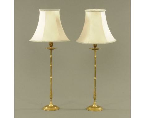 A pair of tall brass candlestick pattern electric table lamps, 57 cm to fitting. CONDITION REPORT: Generally good condition w