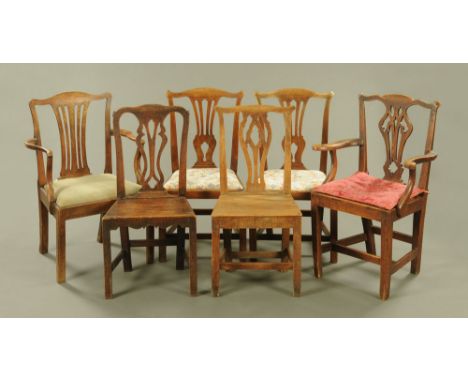 A matched set of two carver arm and four single Chippendale style kitchen dining chairs. CONDITION REPORT: These chairs are a