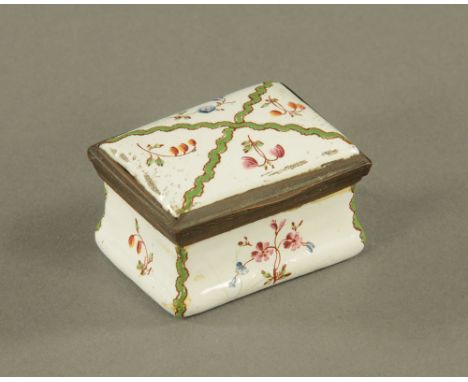 An 18th century white enamel and brass mounted rectangular patch box, with domed lid and incurved sides, decorated in colours