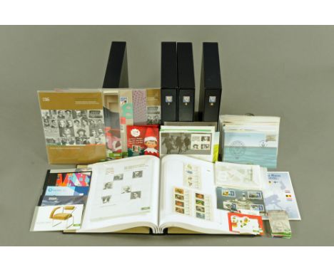 Four albums in slip cases of Irish stamps, in mint condition and a selection of First Day Covers, stamp sheets, stamp books e