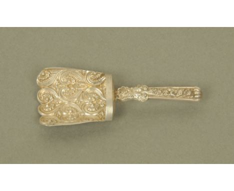A George IV silver shovel form caddy spoon by John Thropp or Joseph Taylor, with floral cast terminal and heart scroll emboss
