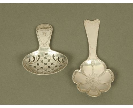 A George III silver caddy spoon, with feather engraved shaped floral bowl, London 1807, and a George III silver caddy spoon w
