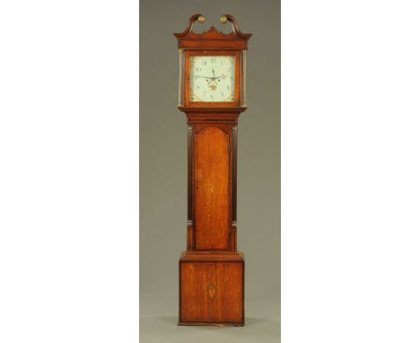 An early 19th century oak and mahogany crossbanded longcase clock, with movement by James smith of Wrexham, the 33 cm painted