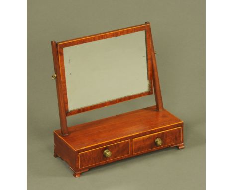 A 19th century mahogany toilet mirror, rectangular and fitted two base drawers and raised on bracket feet.  Width 45 cm, toge