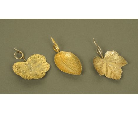 A George III silver gilt leaf form caddy spoon by Matthew Linwood, with scrolled terminal, Birmingham 1808, another silver an