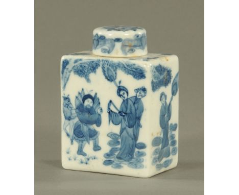 A Chinese blue and white porcelain rectangular tea caddy with cover, decorated with figures.  13.5 cm high.