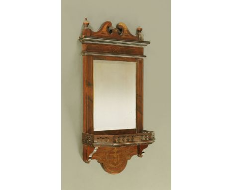 An inlaid rosewood hall mirror with shelf beneath.  Width 34 cm.