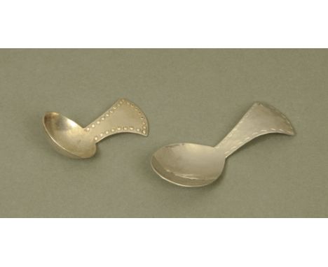 A Keswick School of Industrial Arts planished stainless steel caddy spoon, of Arts and Crafts design, with flared beaded term