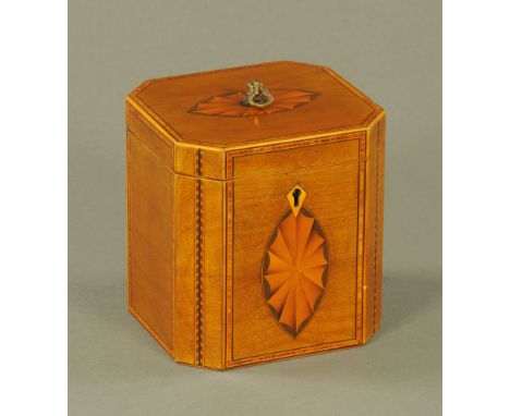 A George III mahogany square tea caddy, with canted sides, inlaid with oval shell paterae, satinwood and herringbone bandings
