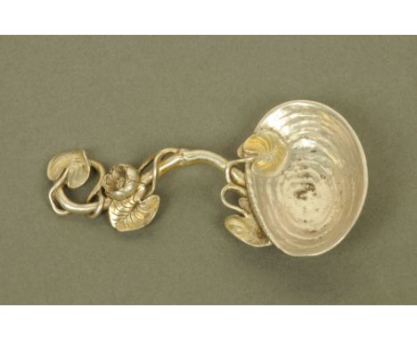 A fine Victorian silver "lily pad and pond" pattern caddy spoon, by Francis Higgins II, London 1857. CONDITION REPORT: This s