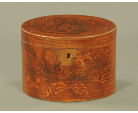A George III mahogany oval tea caddy, inlaid with floral marquetry.  12 cm high.