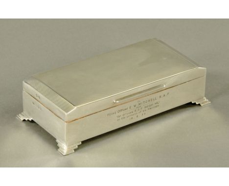 A silver table cigarette box, inscribed to Flying Officer E.W. Mitchell RAF, from the Officers RAF Biggin Hill 1939, engine t