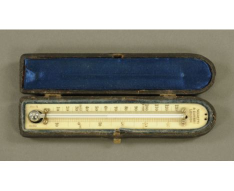 An interesting early 20th century Negretti and Zambra desk thermometer, the ivory scale marked with both fahrenheit and also 