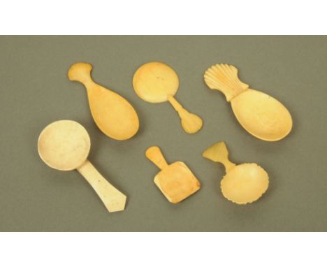 Four late 18th/early 19th century bone caddy spoons, and two ivory caddy spoons.