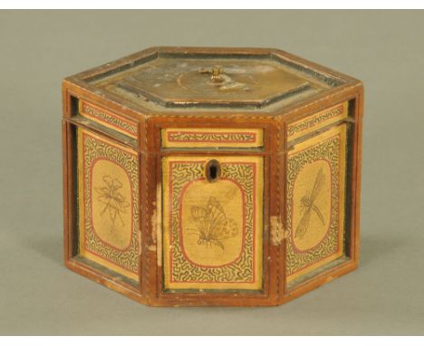 An early 19th century inlaid pine hexagonal tea caddy, the sides inset with gilded panels decorated with butterflies.  11.5 c