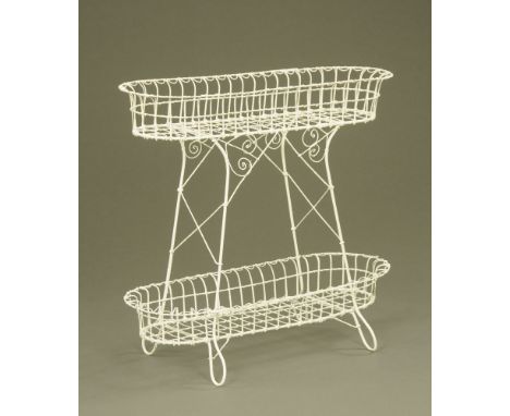 A Victorian wire work two tier planter, white painted.  Height 86 cm, top tier width 94 cm, lower tier depth 37 cm.