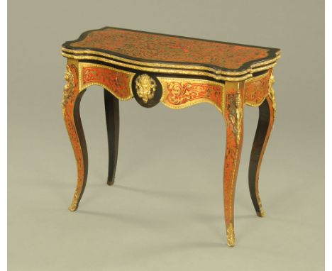 A Victorian boulle marquetry serpentine fronted turnover top card table, with green baize lined playing surface with boulle m