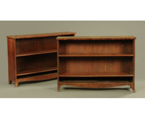 A pair of George IV mahogany low open front bookcases, inlaid with ebonised stringing, each fitted two adjustable shelves on 