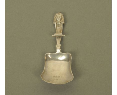 A Victorian silver caddy spoon by Hilliard & Thomason, with Pharoah terminal and plain bowl, Birmingham 1880  (see illustrati