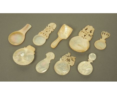 Nine 19th century carved mother of pearl caddy spoons, of varying sizes and designs, several deeply carved with flowers. COND