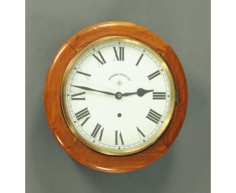 A wall clock with single train spring driven movement and replacement dial, complete with pendulum.  Diameter 39 cm.