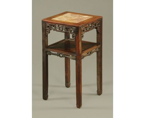 A Chinese hardwood rouge marble topped jardiniere stand with shelf.  Height 80 cm, top 41 cm square (see illustration). CONDI