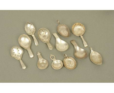 Nine George III silver caddy spoons by Samuel Pemberton, displaying different shapes and designs, all hallmarked for Birmingh