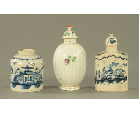 An 18th century Delftware blue and white pottery tea caddy, with domed cover, decorated with rock and island pattern.  15 cm 