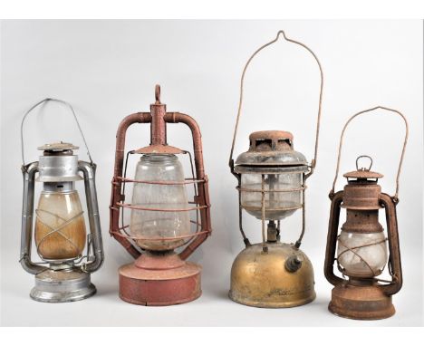 A Collection of Four Vintage Hurricane Lamps 
