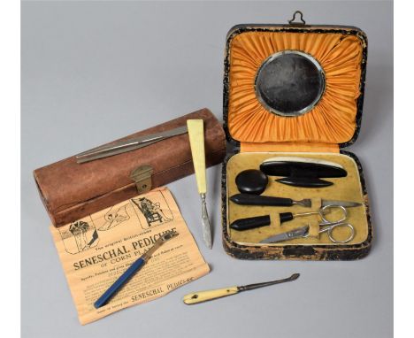 A Ladies Manicure Set and a Domed Topped Box Containing Manicure Tools 