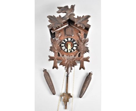 A Mid 20th Century Swiss Cuckoo Clock with Two Weight Movement, 33cm high 