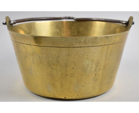 A Vintage Brass Jam Kettle with Iron Loop Handle, 26cm Diameter 