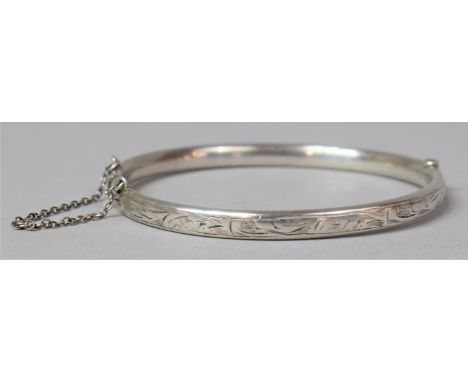 A Silver Bangle with Safety Chain 