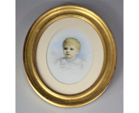 A Gilt Framed Oval Portrait of a Young Boy 