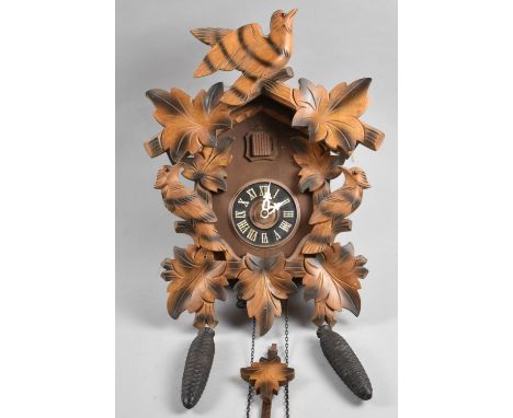 A Mid 20th Century Souvenir Swiss Cuckoo Clock with Two Weights, 30cm high 