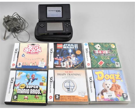 A Nintendo DS Handheld Game Console, Working Order, Together with Six Games 