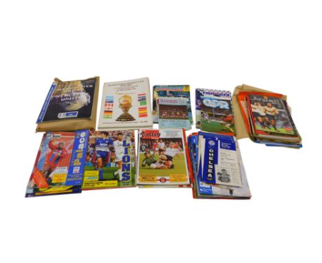 A quantity of football programmes relating to London clubs, Chelsea, Arsenal, West Ham, QPR, various dates. 
