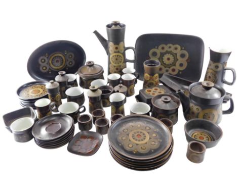A Denby Arabesque pattern part tea, coffee and dinner service, decorated with flowers against a dark brown glazed ground, to 